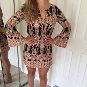 Fun cocktail dress with bell sleeves.
